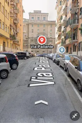 a street with cars parked on the road at Antoni House San Giovanni in Rome