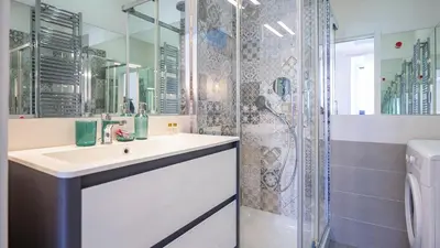 a bathroom with a sink and a shower at EasyTopStay - Stylish Vatican Retreat in Rome