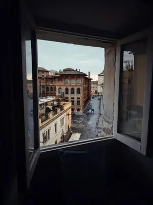 a view of a city street from a window at Piccolo Attico in Rome