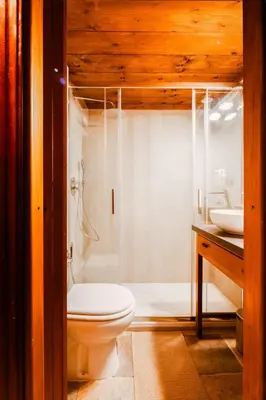a bathroom with a toilet and a shower and a sink at Casa Piccinino in Rome