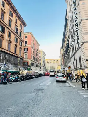 a city street with cars driving down the street at Residenza Abat-Jour de Rome in Rome