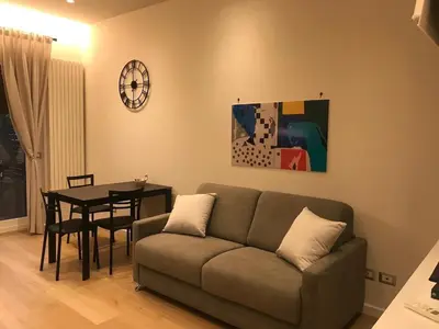 a living room with a couch and a table at Domus de Core in Rome
