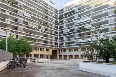 an apartment building with bikes parked in front of it at Trastevere Luxury Studio in Rome
