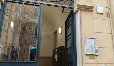 an entrance to a building with an open door at Vatican Luxury Duplex in Rome