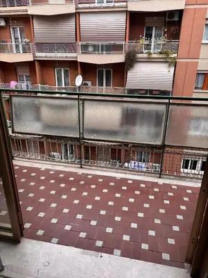 an outside view of a building with a checkered floor at Desiré Flat - Vatican City - Metro Cipro and WiFi in Rome