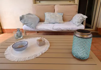 a coffee table with a couch in a living room at Il Punto in Rome
