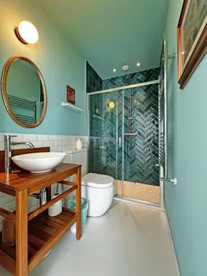 a bathroom with a sink and a shower and a toilet at Roma Parioli - Suite Mediterranea in Rome