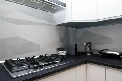a kitchen with a stove top in a kitchen at Casetta Garbatella in Rome