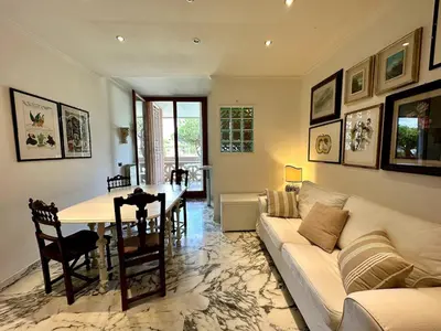 a living room with a couch and a table at The Vatican Studio in Rome