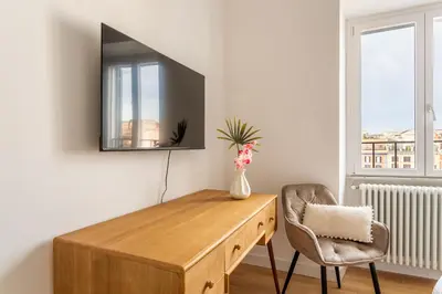 a room with a desk and a chair and a mirror at iFlat Rome Dream, New Cozy & Chic Apartment in Rome
