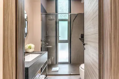 a bathroom with a shower and a sink and a toilet at Parioli Cube Hotel in Rome