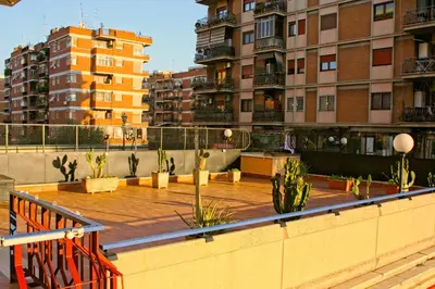 a view of a patio in a city with buildings at Terrazza Majorana in Rome