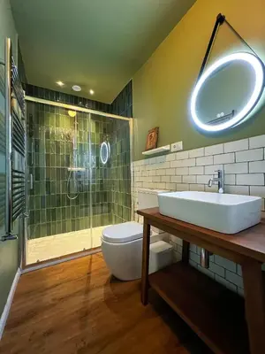 a bathroom with a toilet and a sink and a shower at Roma Parioli Suite Green Harmony in Rome
