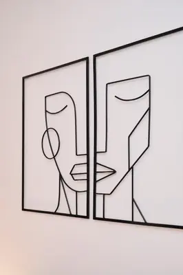 a drawing of two framed pictures on a wall at NEW - La Casetta di Nadia in Rome