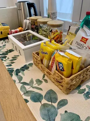 a counter with two baskets of food on a table at Room A in Rome