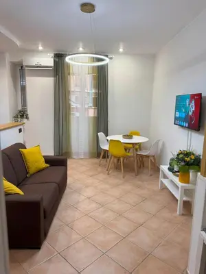 a living room with a couch and a table at Milena's Home Rome Center in Rome