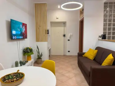 a living room with a couch and a table at Milena's Home Rome Center in Rome