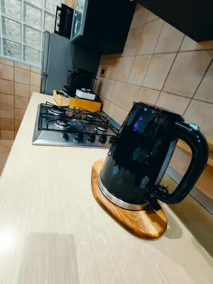 a coffee cup sitting on a counter in a kitchen at Milena's Home Rome Center in Rome