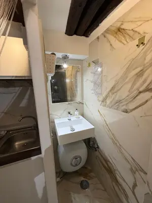 a bathroom with a sink and a toilet at Rome Nest at Campo De Fiori and Navona Square in Rome