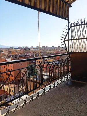 a view of a city from a balcony at Panoramic penthouse 10m from metro A in Rome