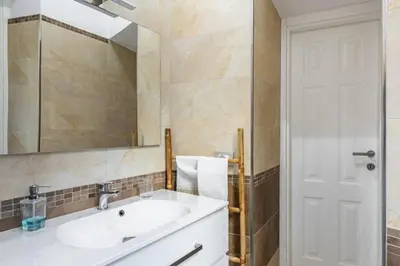a bathroom with a sink and a mirror at Stradivari in Rome