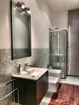 a bathroom with a sink and a shower and a toilet at San LoFt in Rome