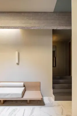 a room with a bench and a staircase at ATEL Guest House in Rome