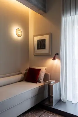 a bed in a room with a window at ATEL Guest House in Rome