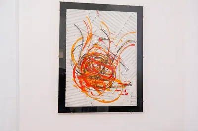 a picture of orange paint on a white wall at Elegantis Solinda Suite Apartment with Private Terrace - Steps from Metro, Tram & Bus to Rome's Historic Center in Rome