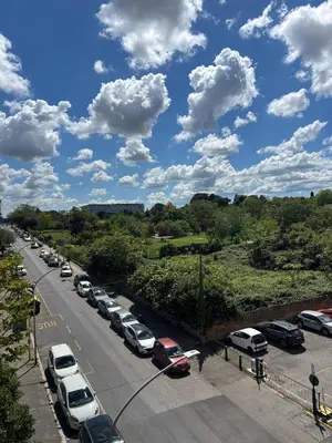 a bunch of cars parked in a parking lot at Casa da favola Roma in Rome
