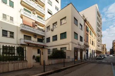 an apartment building on a street in a city at GuestHost - RM Veio 52B in Rome