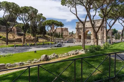 a view of the colosseum and a park at Luxe Escape Colosseo in Rome