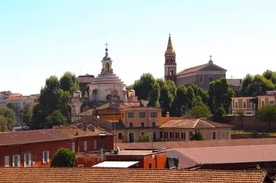 a view of a city with buildings and mosques at Luxe Escape Colosseo in Rome