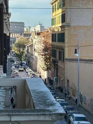 a view of a city street with parked cars at Luxe Escape Colosseo in Rome