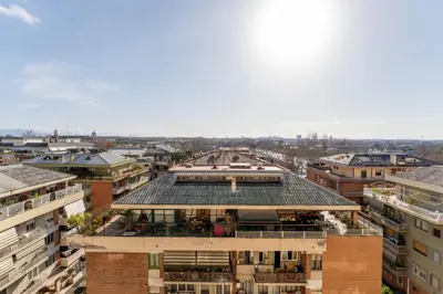 an overhead view of a building in a city at Cielo Suite, Panoramic Apt View with Jacuzzi in Rome
