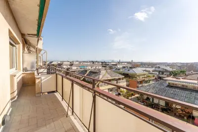 a balcony with a view of a city at Cielo Suite, Panoramic Apt View with Jacuzzi in Rome
