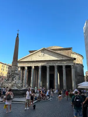 a group of people standing in front of a building at Piazza NAVONA - CAMPO dei FIORI in Rome