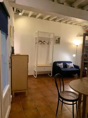 a living room with a couch and a table at Ideal for your Roman Holidays in Rome