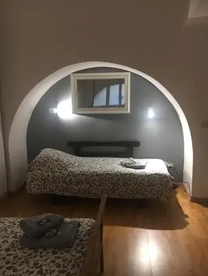 a room with a bed and a window in it at Cenci Rome Centro Storico in Rome