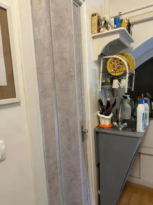 a kitchen with a counter and a sink in a room at Cenci Rome Centro Storico in Rome