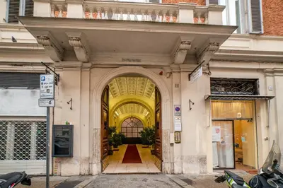 an entrance to a building with an archway at Stella Luxury House - Lombardia in Rome