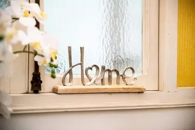 a window with a sign that says love on it at Stella Luxury House - Lombardia in Rome