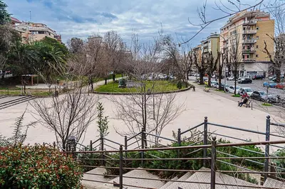 a view of a park with trees and buildings at Casa Cesari in Rome
