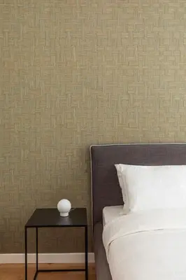 a bedroom with a bed and a side table at Casa Dante in Rome