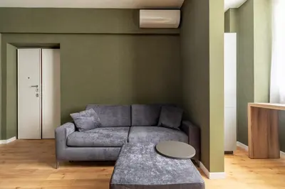 a living room with a couch and a table at Casa Dante in Rome