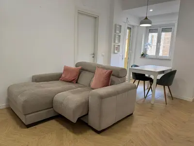 a living room with a couch and a table at Casal Sweet Home in Rome