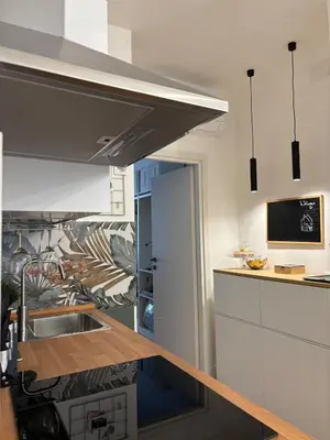 a kitchen with a sink and a counter top at Ilia12 home in Rome