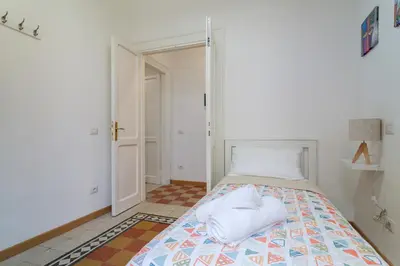 a bedroom with a bed with towels on it at Studio Piramide in Rome