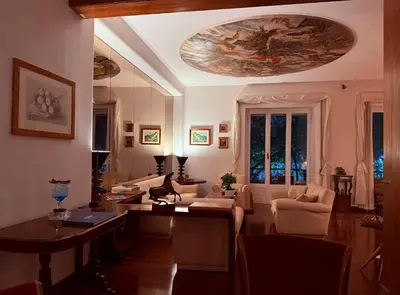 a living room with a painting on the ceiling at Luxury Home Museum - Roma - RAI - Stadio Olimpico - Vaticano - Musei Vaticani - Centro - Clodio in Rome