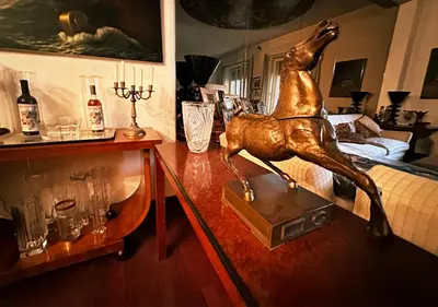a living room with a statue of a horse on a table at Luxury Home Museum - Roma - RAI - Stadio Olimpico - Vaticano - Musei Vaticani - Centro - Clodio in Rome
